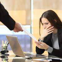 woman-being-fired.jpeg